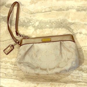 Used Authentic COACH wristlet with letter C